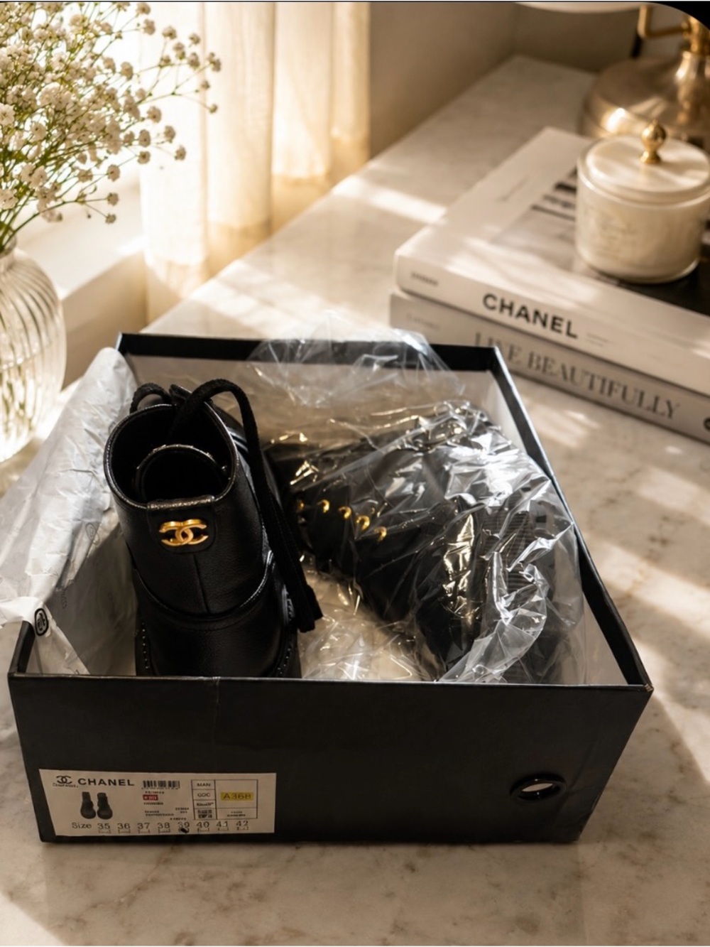 CHANEL Black Leather Lace-Up Combat Boots with Gold-Tone Eyelets - Picture 5 of 6